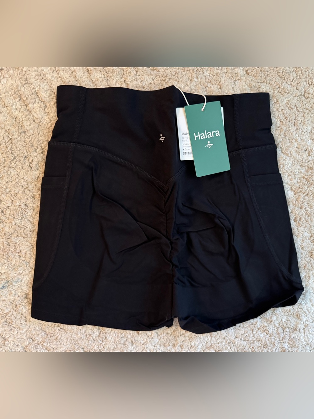 Halara Black UltraSculpt high waist scrunch butt shorts w/ pockets. Size S. NWT.
